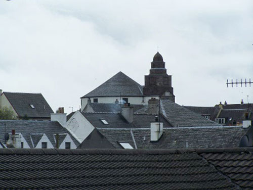 round church across bowmore rooftops